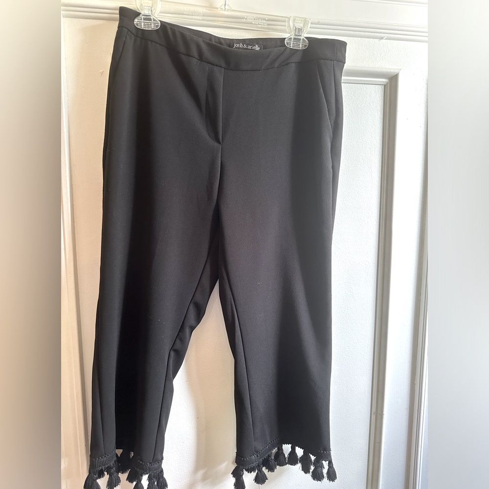 Black pull on slacks with fringes on the bottom